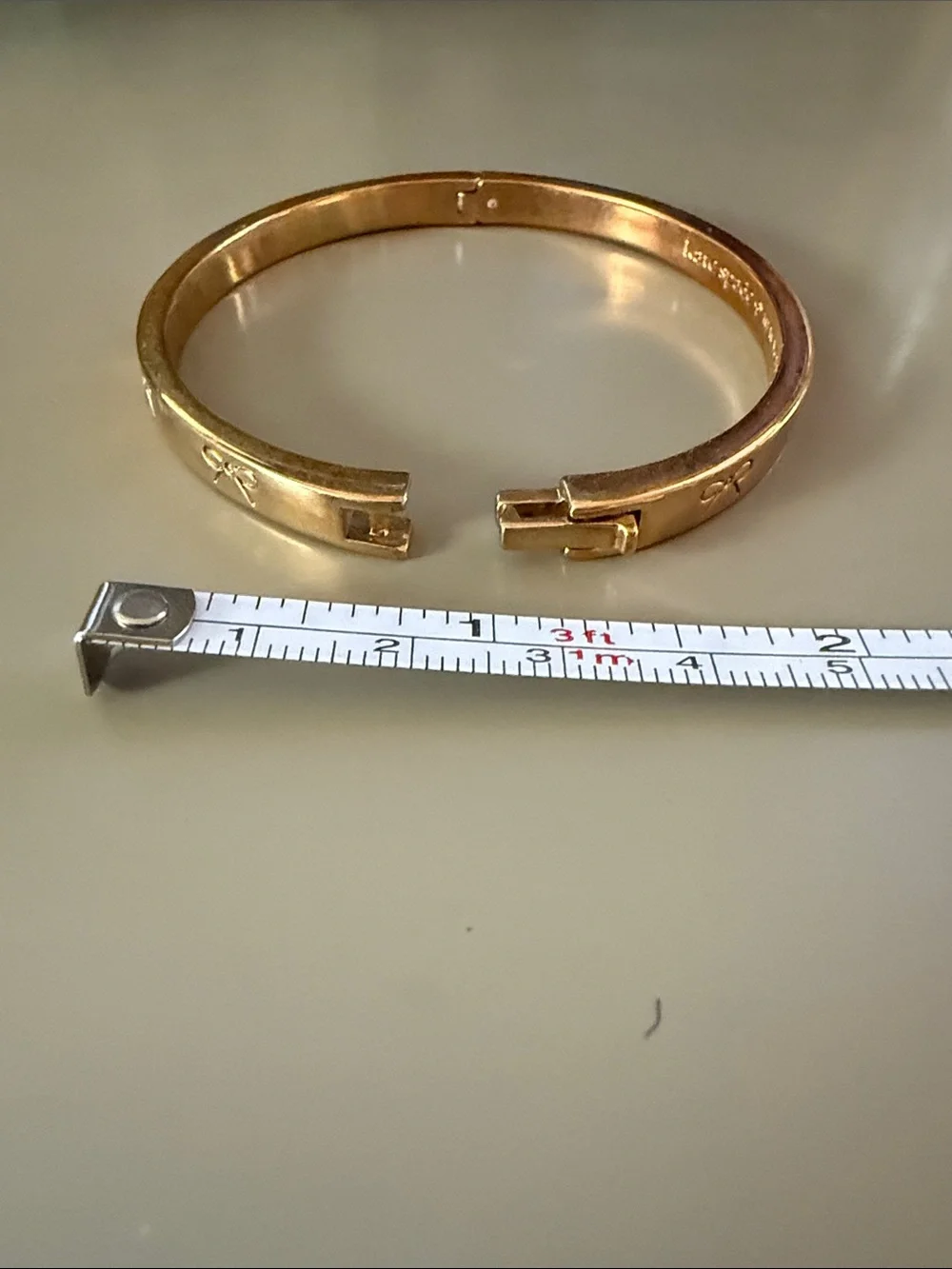 kate spade Gold Bow-Embossed Bangle Bracelet
